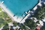 aerial photography of boats docked near shore