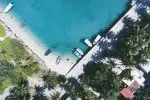 aerial photography of boats docked near shore